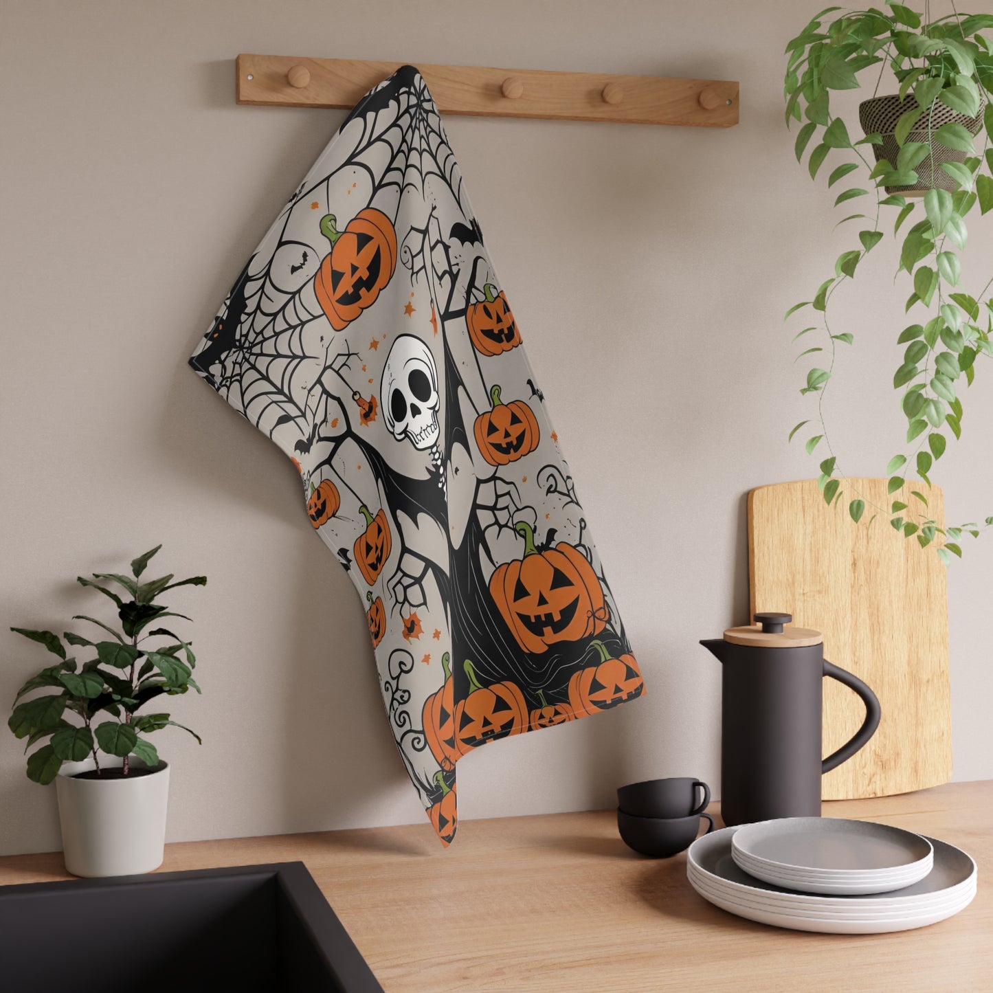 Smiling Skeleton Halloween Tea Towel – Jack-O’-Lantern and Cobweb Design