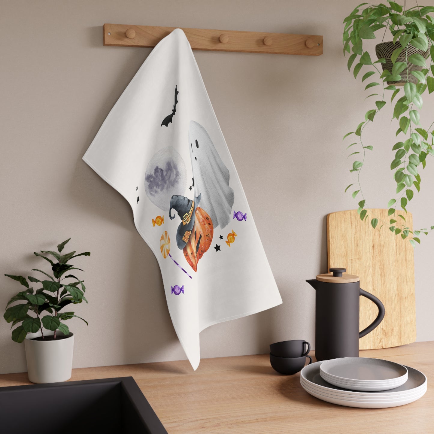 Smiling Pumpkin Halloween Tea Towel – Witch Hat, Ghost, and Candy Design