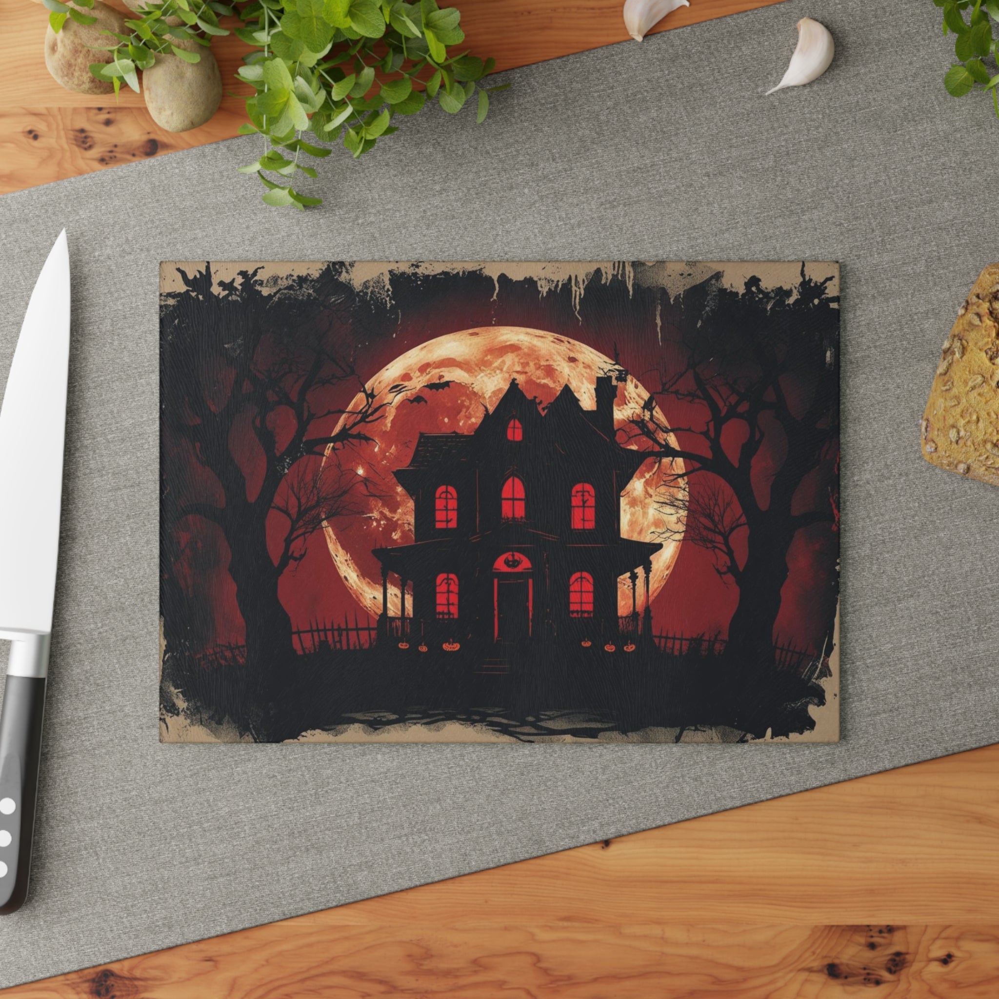 Spooky Halloween Cutting Board with Haunted House Silhouette
