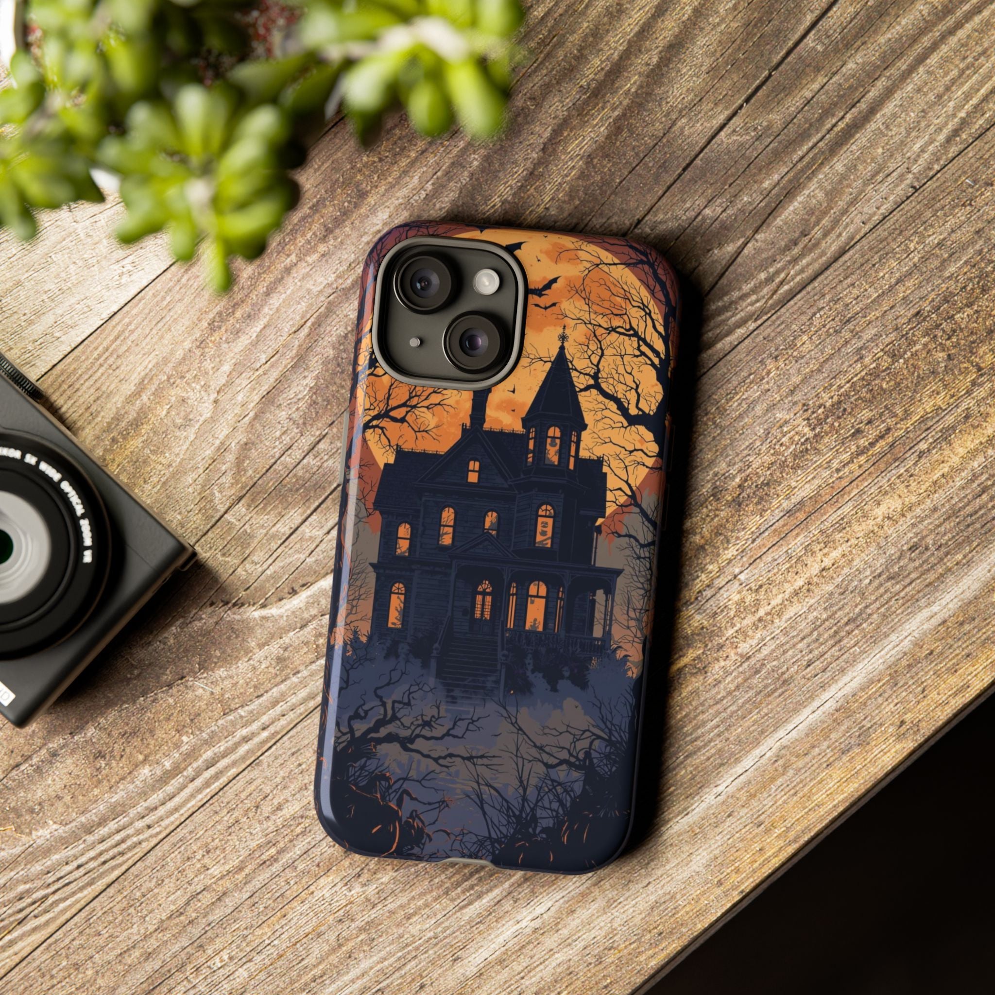 Spooky Halloween Phone Case with Haunted House Silhouette