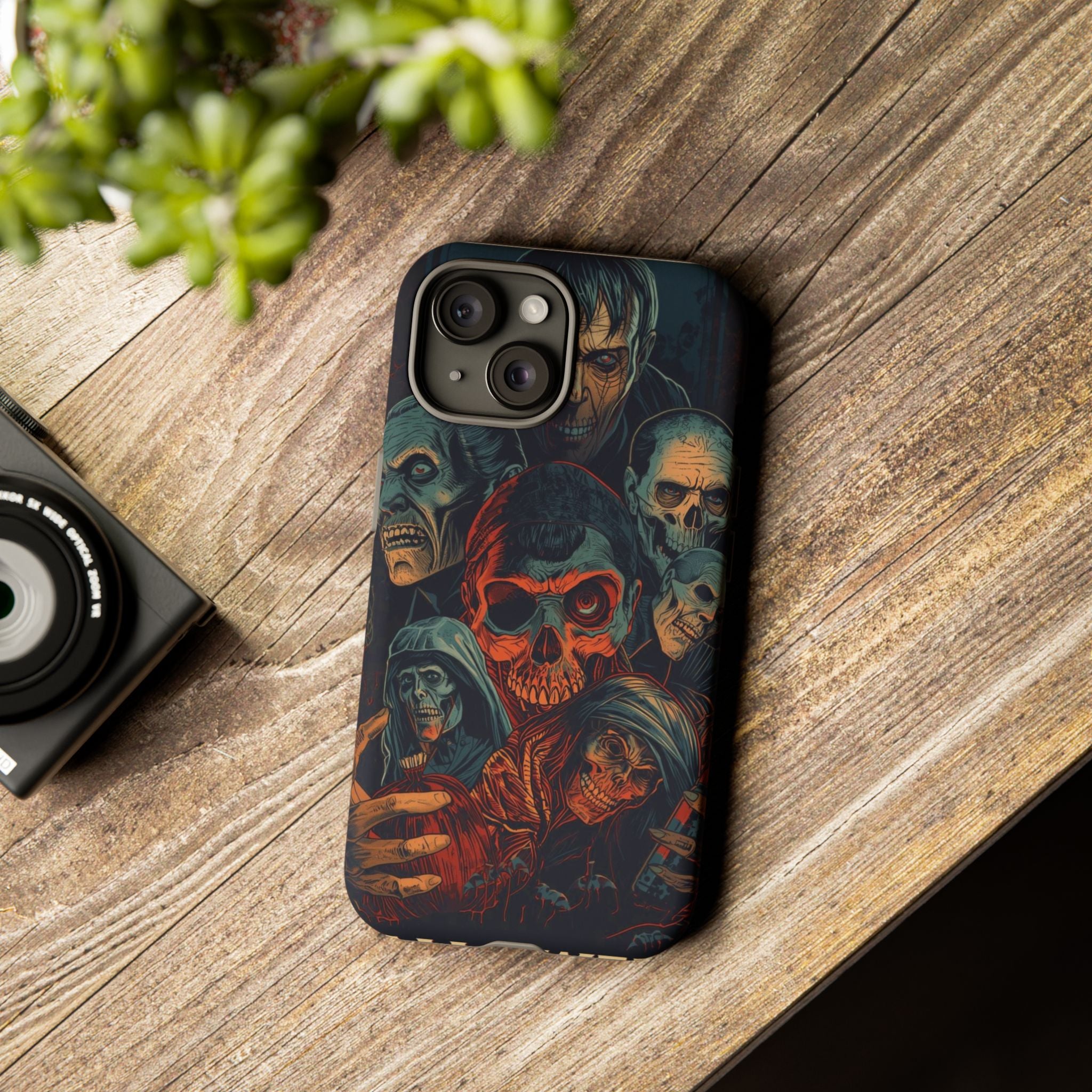 Halloween Phone Case with Skulls and Spooky Faces Design