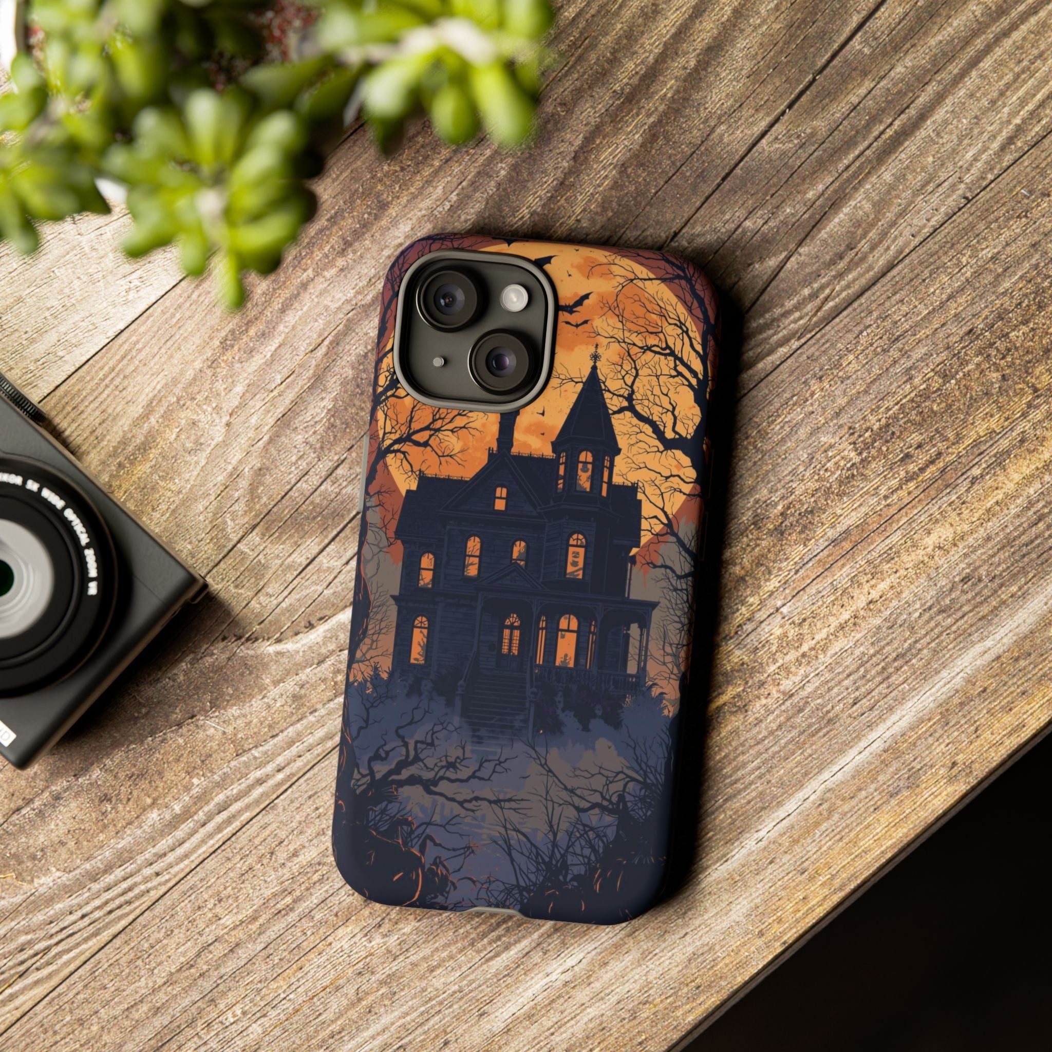Spooky Halloween Phone Case with Haunted House Silhouette